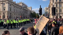 Hundreds of police stand ready in Parliament Square on a day of rolling protests
