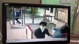 Dramatic CCTV footage shows armed bank robbery in India