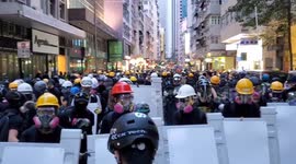 Hong Kong Protesters retreat through the streets of Wanchai