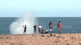 Nervy moment hapless tourists in Australia get perilously close to dangerous water spouts