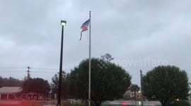 American flag torn but still flying after Hurricane Dorian hits South Carolina