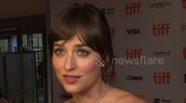 Dakota Johnson talks about Casey Affleck's ping pong skills on red carpet in Toronto
