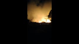 forest fire behind college, in the center of town