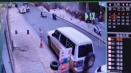 Explosion sends door flying, taking out scooter rider, in China
