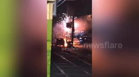 Faulty voltage transformer explodes sending sparks onto Chinese street
