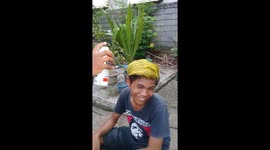 Filipino teenager uses can of yellow spray paint to go blonde