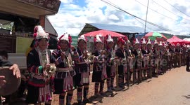 Vibrant Tribal Procession Through Mountain Roads In Thailand
