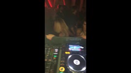When girls hang off the front of the DJ booth