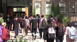 Students on campus at University of Toronto on a fine sunnny day in September