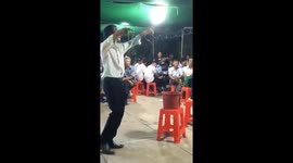 The man used his mouth to keep the heads of living snakes