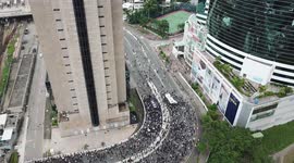 Drone view shows thousands of anti-extradition bill protesters march through Hong Kong's Sha Tin