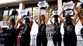 PETA activists cover themselves in 'toxic slime' during protest at London Fashion Week