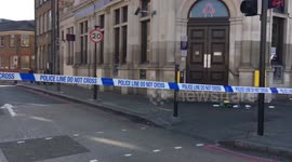 Friends of a young man who was knifed to death on a busy high street said he was in the wrong place at the wrong time.