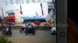 Horrific moment illegally erected hoarding kills bike-riding woman as it comes loose in southern India