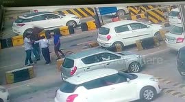 Angry commuter smashes huge metal can on toll worker's head after row in India