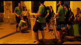 drumming group playing at a street festival in barcelona