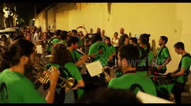 drumming group playing at a street festival in barcelona
