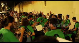 drumming group playing at a street festival in barcelona