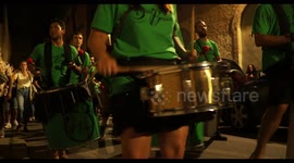 drumming group playing at a street festival in barcelona