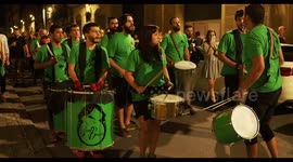drumming group playing at a street festival in barcelona