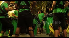 drumming group playing at a street festival in barcelona