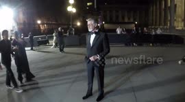 Bond stars Pierce Brosnan and Naomie Harris attend charity event