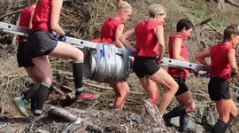 Teams haul barrel of beer over UK mountain in bizarre competition