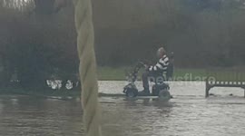 Flood water doesn't stop badass pensioner
