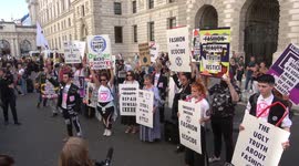 Activists demonstrate outside Victoria Beckham’s show at London Fashion Week