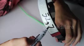 Man customises his headphones with spray paint and Japanese characters