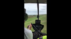 Passenger on a small helicopter flying lesson
