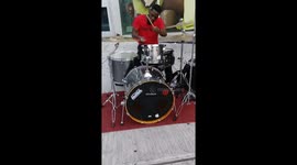 Playing drums
