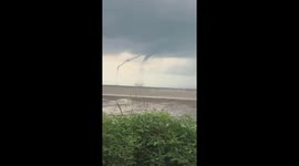 Rare double waterspout spotted swirling off Vietnam coast