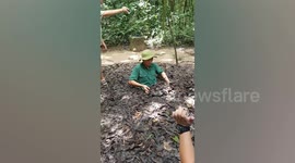 Vietnam tour guide shows secret underground tunnels used in the war