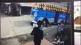 Man miraculously escapes after being trapped under bus in south India