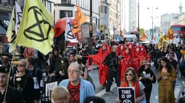 Extinction Rebellion hold a funeral on London Fashion Week's final day