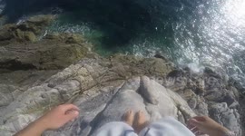 Man narrowly avoids injury after jumping into sea from high cliff in France