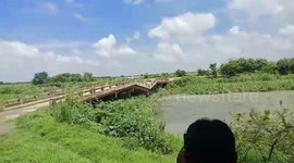 Concrete bridge in Thailand collapses from power of flooded river after heavy rain