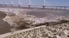 Chinese man miraculously survives after being swept away by rapid tidal wave
