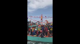 Hundreds of boats participate in the procession of whales festival in Vietnam