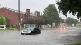 Cars and communities in Houston ravaged by high water from Tropical Depression Imelda