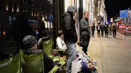 iPhone enthusiasts queue all night at London's flagship Apple store for new release