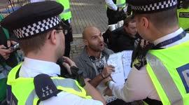 Police in London arrest Extinction Rebellion protesters reciting prayers