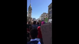 Climate change protesters march through Brighton streets with banners in hand