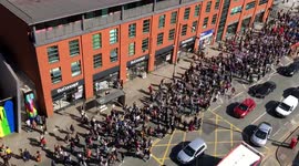 Thousands of climate change activists seen lining the streets of Manchester