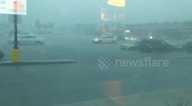 Parking lot in Winnipeg flooded from powerful thunderstorm