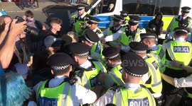 Scuffles as climate change protesters CLASH with police in London