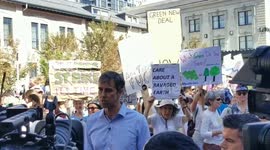 Texas house representative Beto O'rourke talking about climate change during rally in Denver
