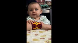 Baby eating my bracelet