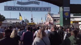 Oktoberfest: Tens of thousands storm gates as beer festival opens